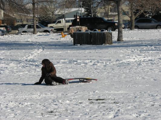 Malia sledding.
