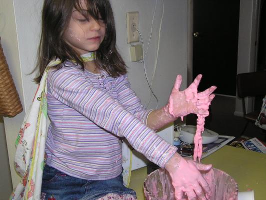 Andrea plays in our pink goo.