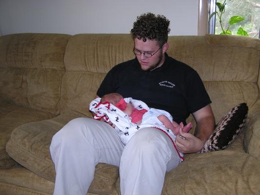 Uncle Titus checks out his new nephew