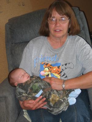 Bea hold baby Jonathan.