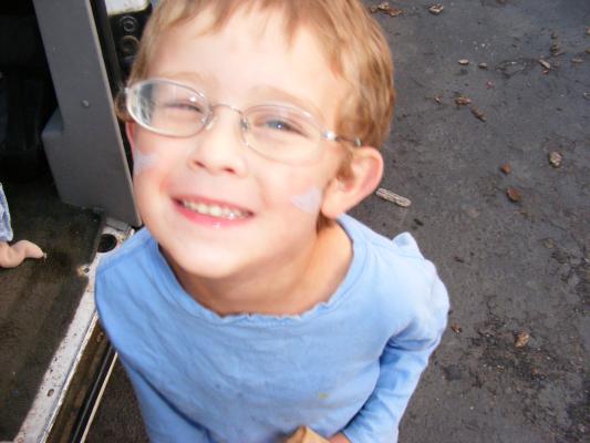 Noah with his face painted.