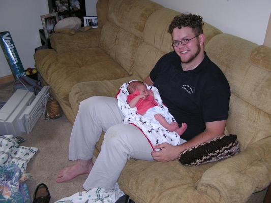 Uncle Titus shows off his new nephew
