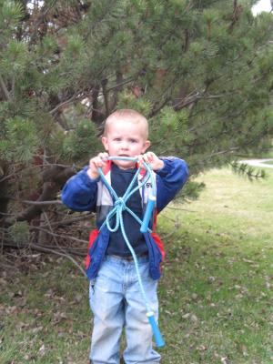 Noah's all tied up in jumprope.