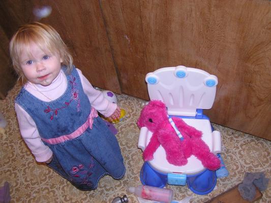 Sarah helps her bear learn good hygene