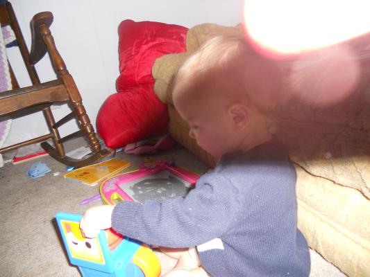 Joshua with a new birthday toy. 