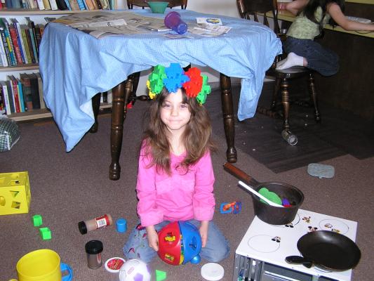 Andrea wears a lego crown.