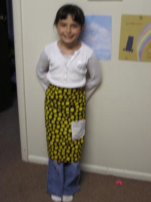 Malia in her new apron without a flash.