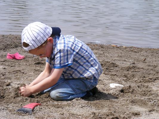 Noah digs while patching.