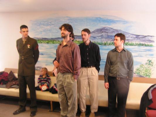 the five boys, except Myke is in front of Jim.