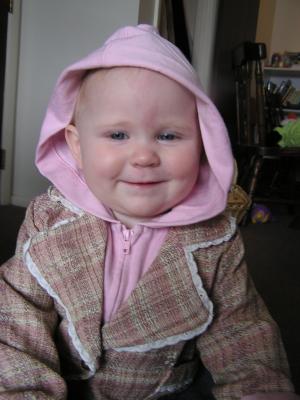 Happy Sarah in a pink hoody.