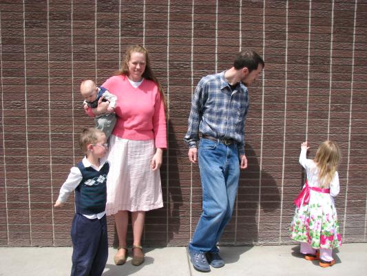 Trying to get a family photo. Katie looks ok.