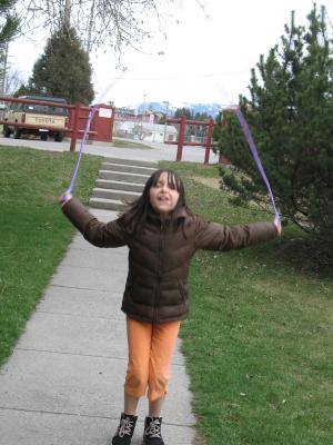 Malia plays with a jumprope.