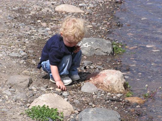 Noah picks some good rocks.