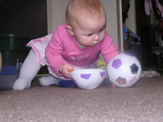 Sarah plays with toys.