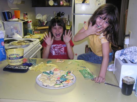 Malia and Andrea frost sugar cookies.