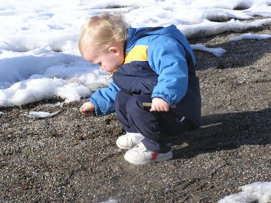 Noah likes to play on the beach, even in the winter.