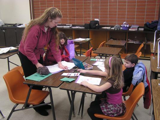 Katie teachers Andrea, Adam and Mickala at Sunday School