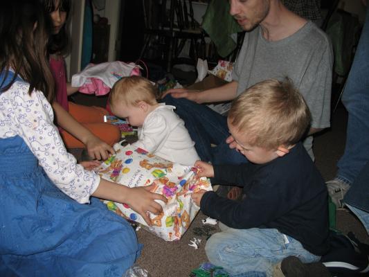 Noah gets to open one too.
Sarah plays with the animals.