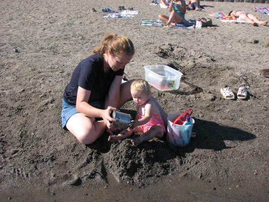 Katie and Sarah play in the sand