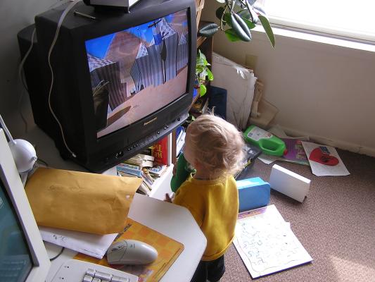 Noah watches Veggie Tales with Larry the Cucumber.