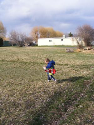 Noah flies the kite.