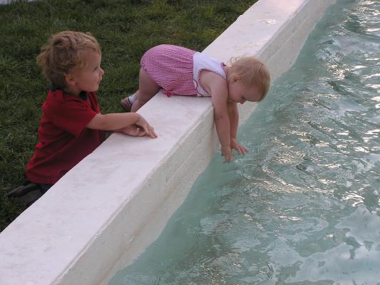 Noah and Sarah play in the Alliance Fountain