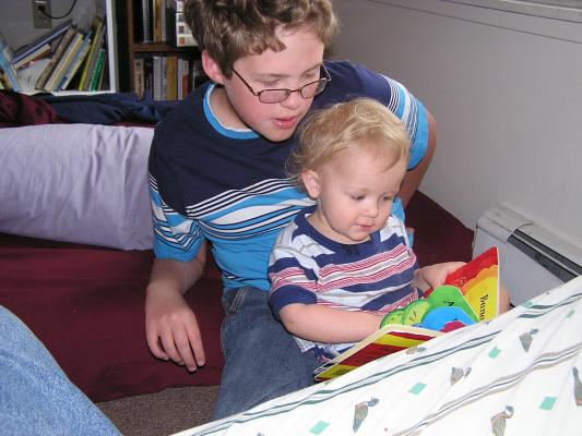 Joe and Noah read a book.