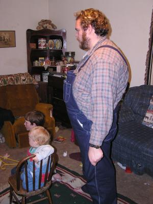 Everyone watches Jedi Joe play with the light saber game.