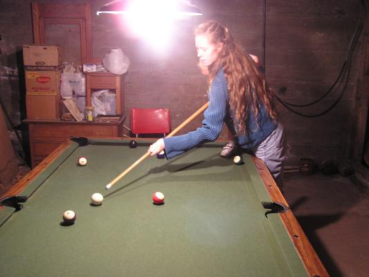 Twelve ball in the corner pocket.