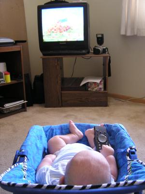 Babies aren't supposed to have the remote
until they're two...except   for me.