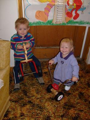 Noah and Sarah ridding toys