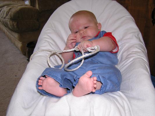 Noah tries to tie a bowline.