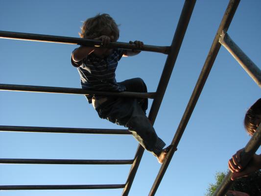 Noah on monkey bars