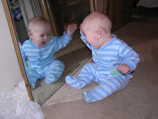 That's a pretty funny baby in the mirror.