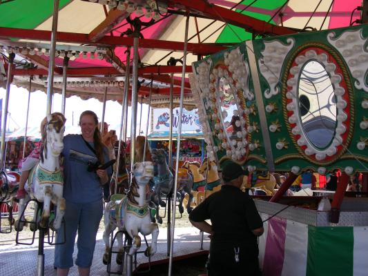 Sarah on the Carousel at the carnival