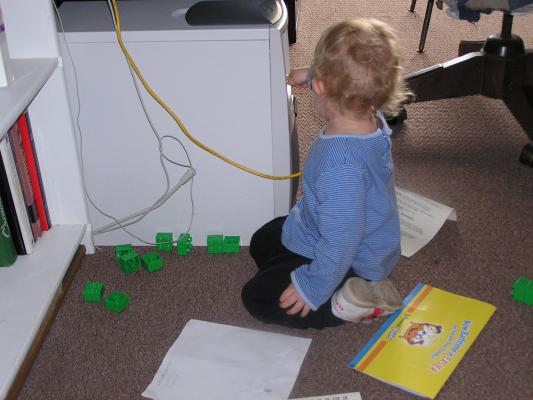 Oops, Noah decided to play with the computer cables.