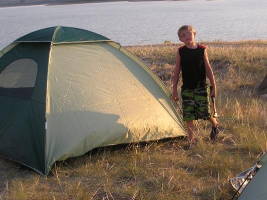 Tanner is done putting up his tent.