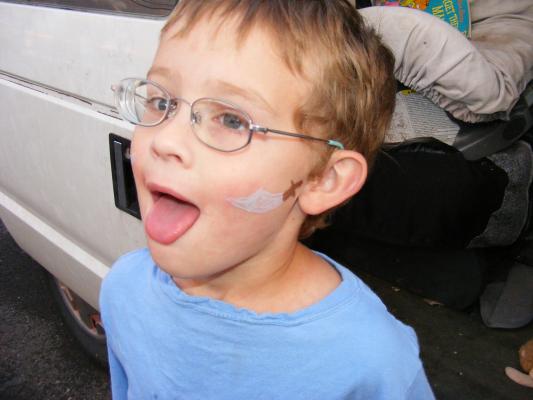 Noah with Swards on his face.