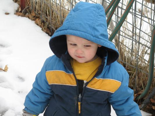Noah plays outside.