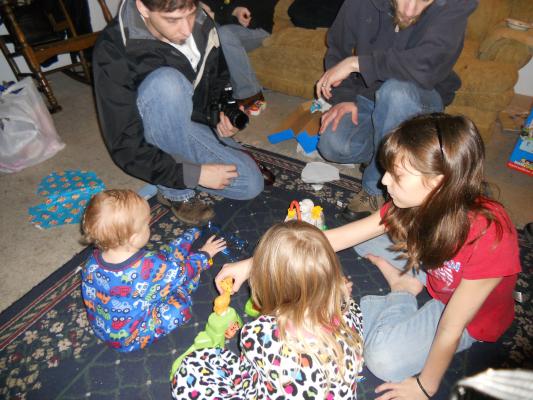 Mike, David, Andrea, Sarah and Joshua play with the zoo. 