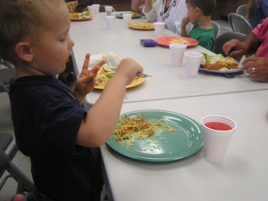 Noah eating spaghetti