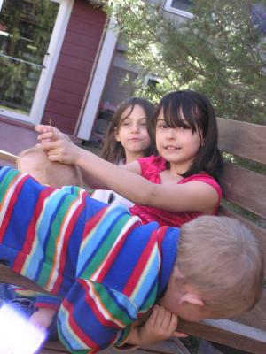Kids play on the bench.