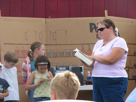 Carolyn reads to VBS kids