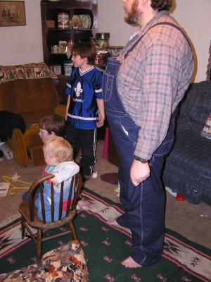 Everyone watches Jedi Joe play with the light saber game.