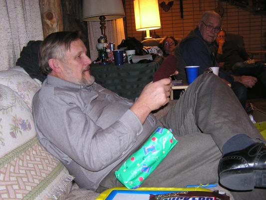 Walt opens his evil Santa gift.