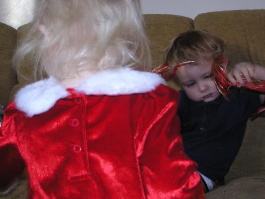 Sarah in her pretty Christmas dress and Noah