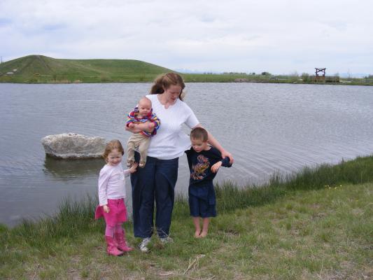 Sarah, Joshua, Katie. and Noah at the lake near the Dinosaur park.