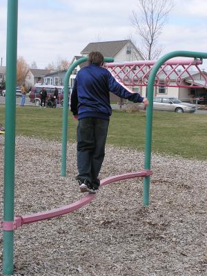 Kids play at the park before the Easter egg hunt.