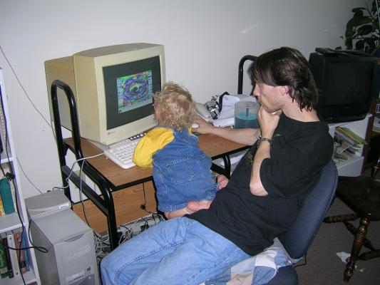 David and Noah play on the computer.