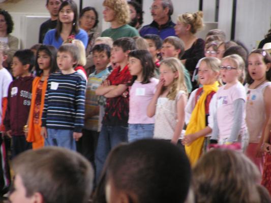Malia singing with her school.